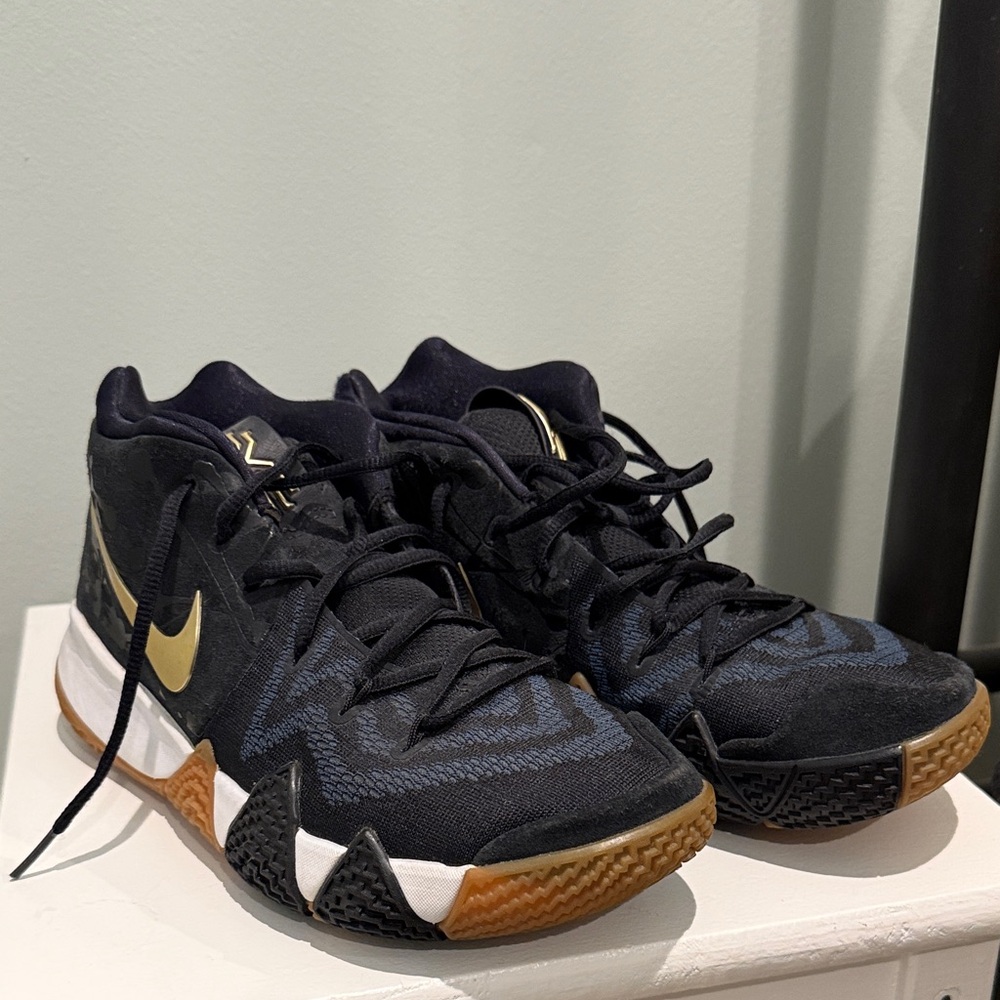 K Ervin Nike Black and Gold Sneakers